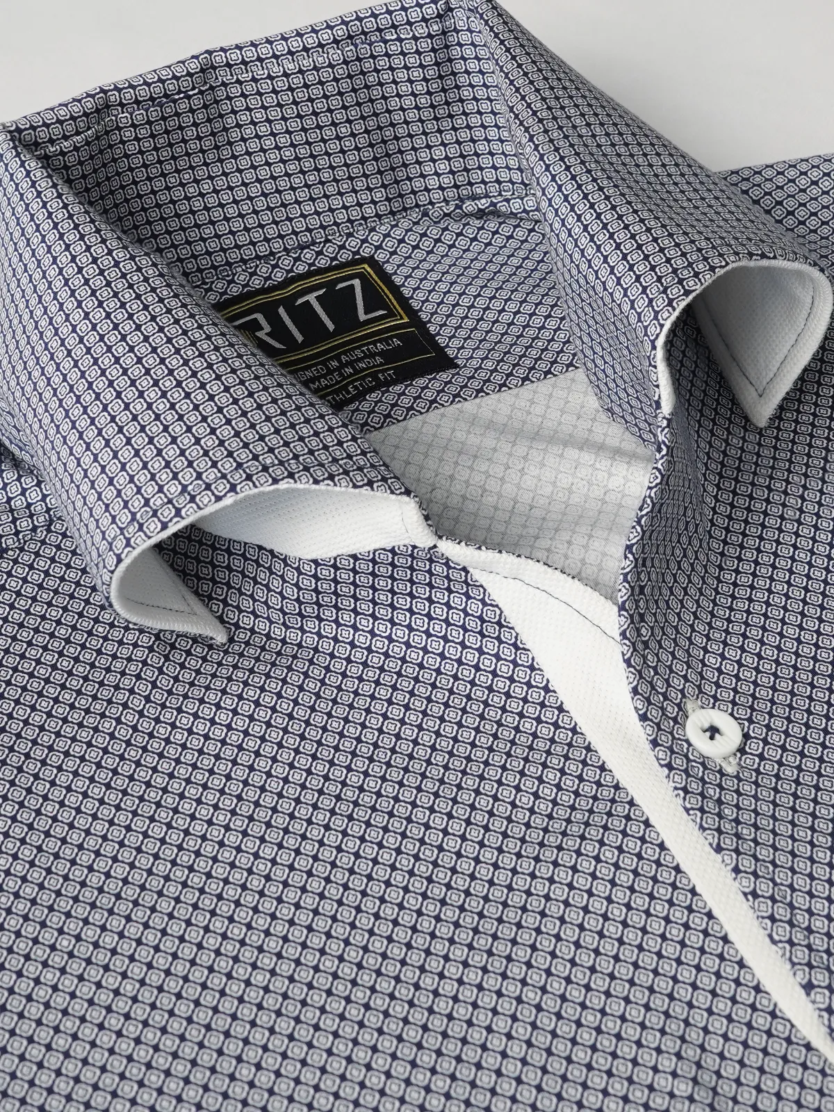 Ritz Exclusive: Navy Medallion One-Piece Collar Smart Polo