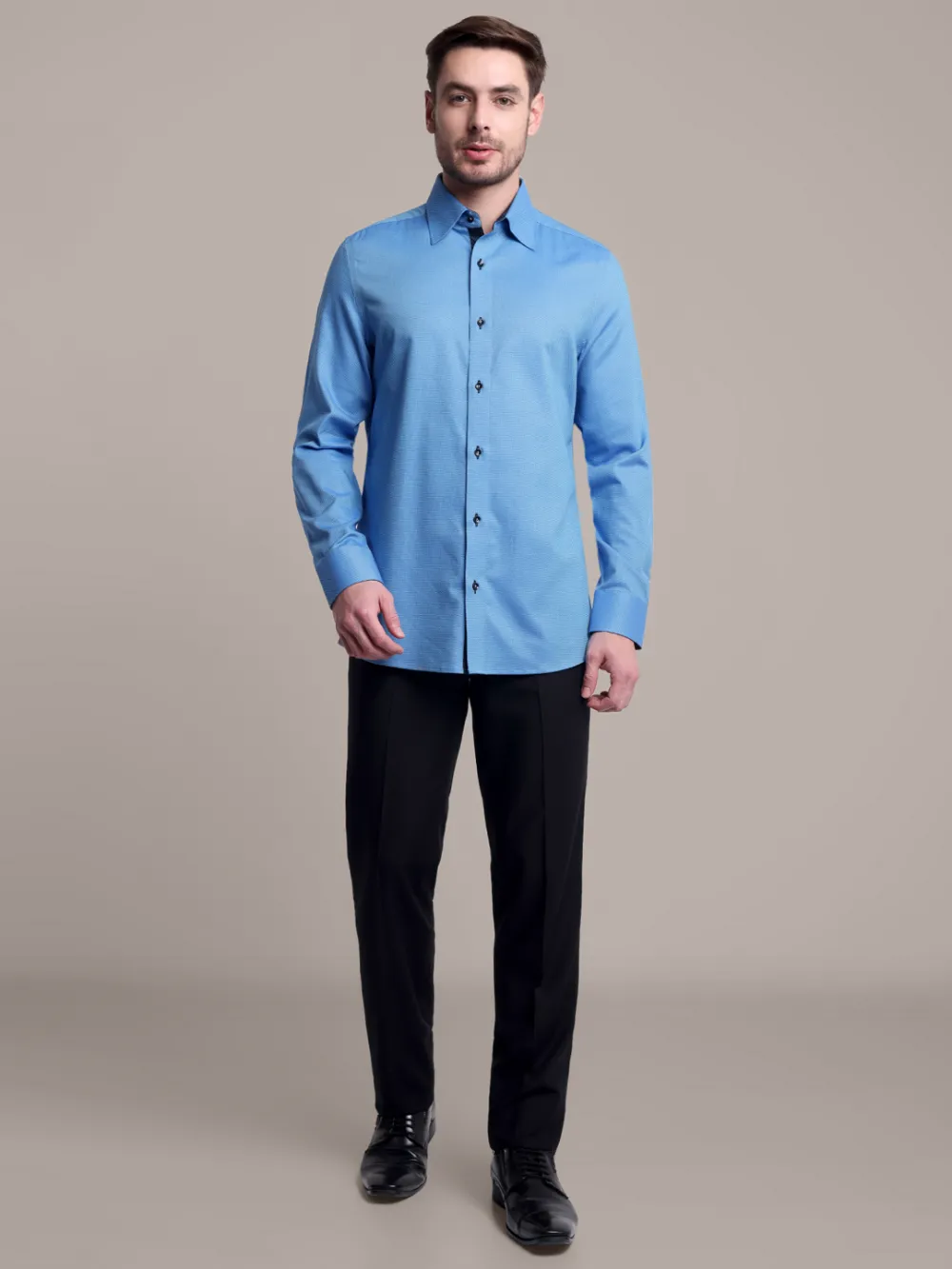 Topaz designer pair of plain turquoise shirt and black trousers
